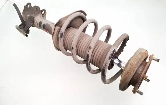 Nissan Almera N16 Front shock absorber with coil spring 333310