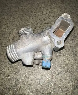 Thermostat/thermostat housing