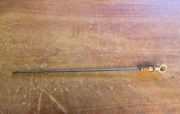 Oil level dip stick