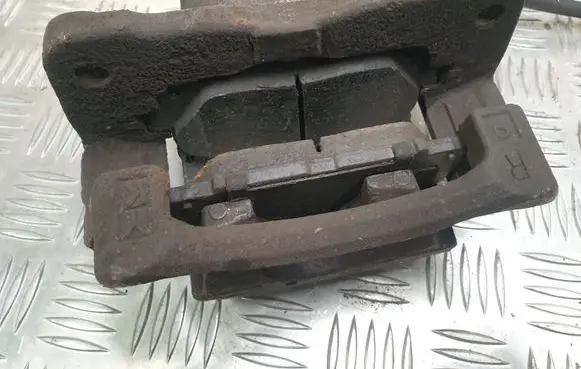 Toyota Prius (XW30) Front brake caliper