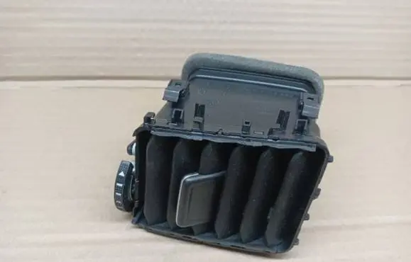 Dash center air vent grill