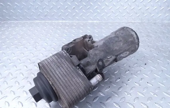 Skoda Octavia Mk2 (1Z) Oil filter mounting bracket 045115389E