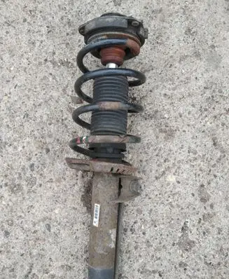 Volkswagen Golf V Front shock absorber with coil spring