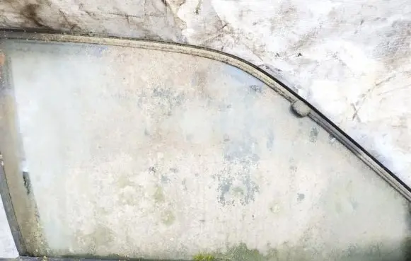 Mazda 626 Front door window glass four-door