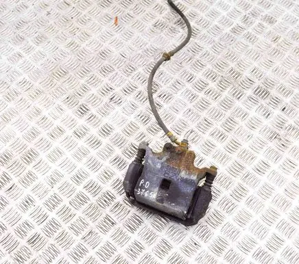 Nissan Juke I F15 Front brake caliper