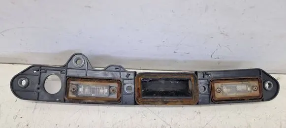 Volkswagen Jetta V Trunk door license plate light bar 1T0827574J