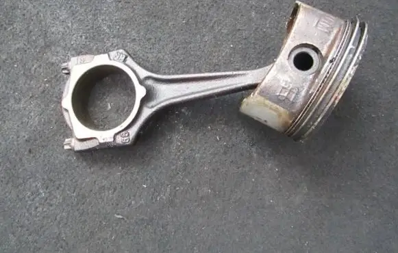 Piston with connecting rod