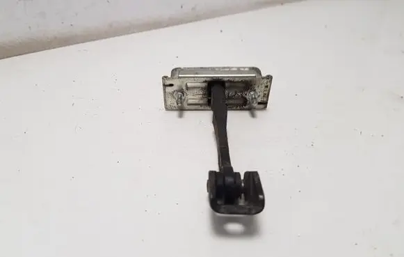 Front door check strap stopper