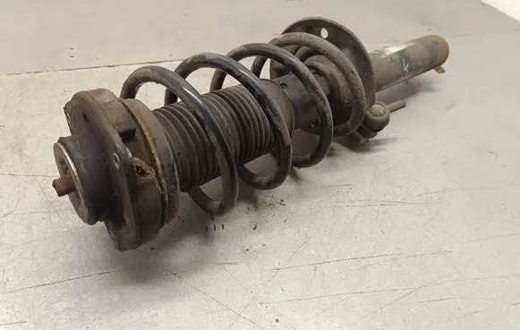 Volkswagen Touran II Front shock absorber with coil spring 1T0412015P 1K0400053PB 6100013D7KNF