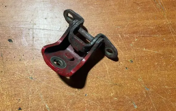 Nissan Micra Rear door upper hinge
