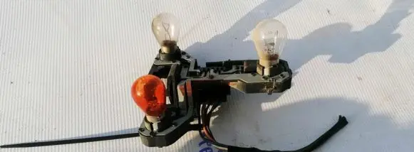 Renault Scenic I Tail light bulb cover holder