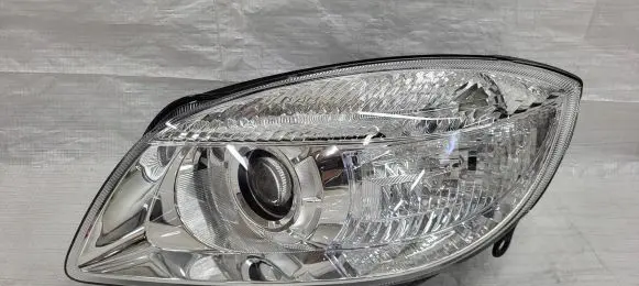 Skoda Fabia Mk2 (5J) Headlight/headlamp 1EL24702525