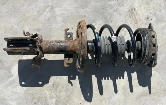 Renault Megane III Front shock absorber with coil spring
