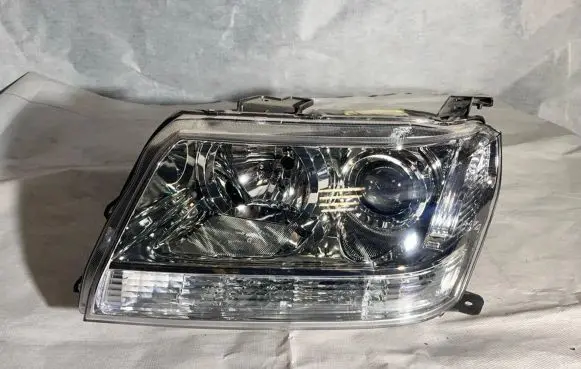 Suzuki Grand Vitara I Headlight/headlamp 082181135L 083181109L