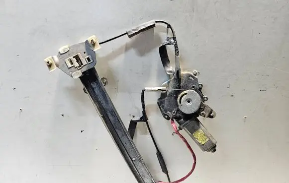 Mitsubishi Colt Front door window regulator with motor MB590725 MB63R