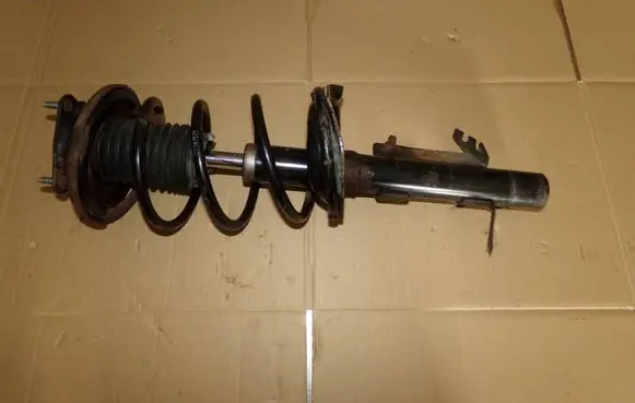 Ford Focus Front shock absorber with coil spring