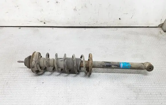 Volkswagen Golf III Rear shock absorber with coil spring 105739