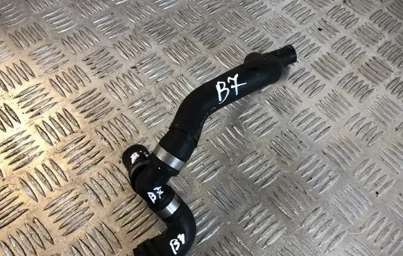 Volkswagen PASSAT B7 Engine coolant pipe/hose 1K0121087AD