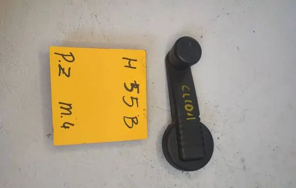 Renault Clio I Front door window winding handle 7700794752