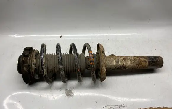 Skoda Octavia Mk2 (1Z) Front shock absorber with coil spring