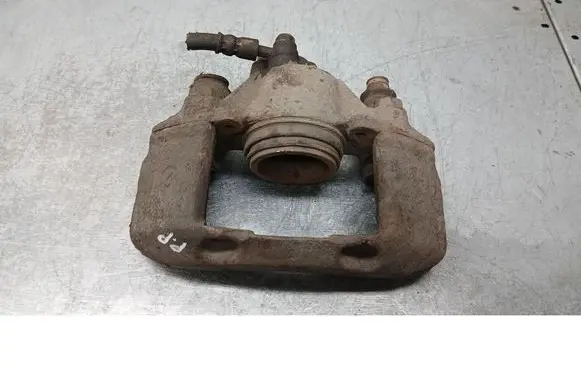 Mazda 323 F Front brake caliper 