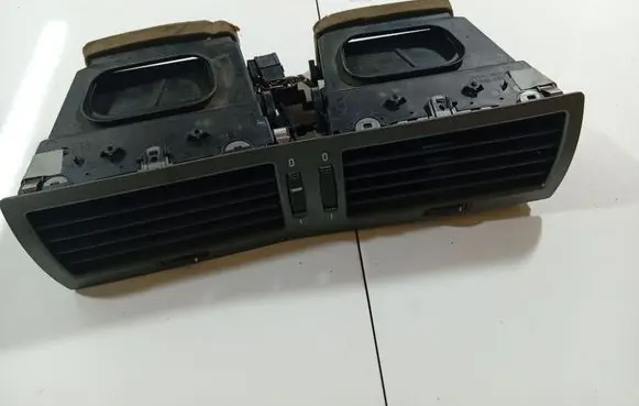 Dash center air vent grill