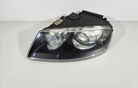 Volkswagen Touareg I Headlight/headlamp 103419012875