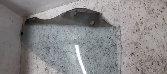 Mazda 323 F Front door window glass four-door