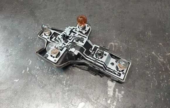Volkswagen Touran I Tail light bulb cover holder 1T0945258A
