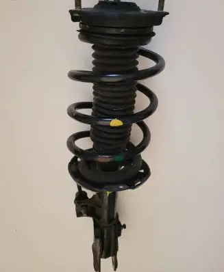 Hyundai Tucson TL Front shock absorber with coil spring