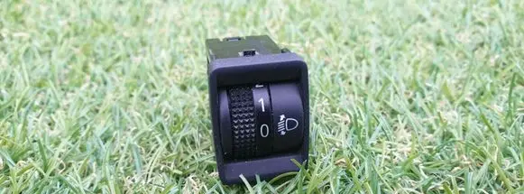Nissan Leaf I (ZE0) Headlight level height control switch 50316B