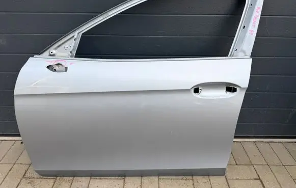 Volkswagen PASSAT B9 Front door 3J0831311B