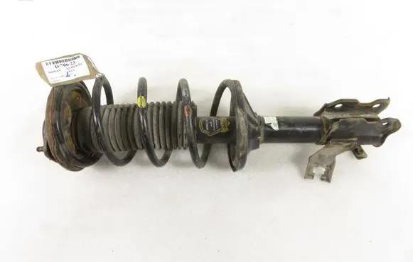 Nissan Almera Front shock absorber with coil spring