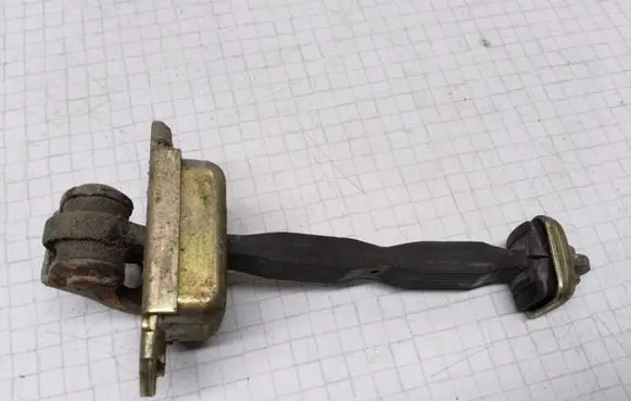 Nissan Almera Tino Front door check strap stopper