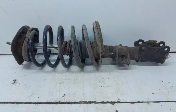 Volvo V70 Front shock absorber with coil spring 8667253A