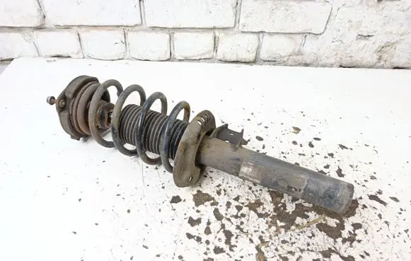Volkswagen PASSAT B7 Front shock absorber with coil spring