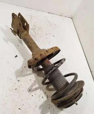 Subaru Legacy Front shock absorber with coil spring 20310ag520