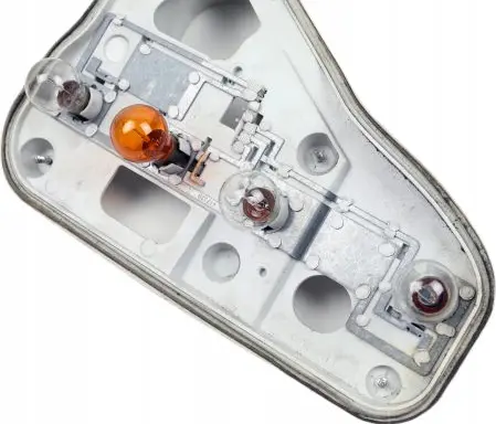 Tail light bulb cover holder