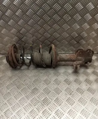 Nissan Almera Front shock absorber with coil spring
