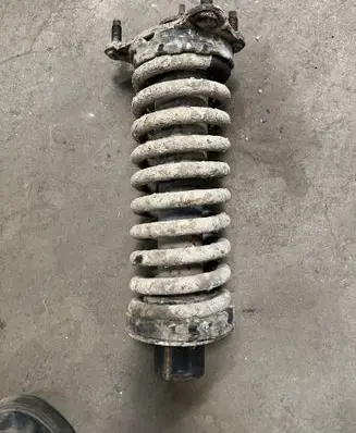 Front shock absorber with coil spring