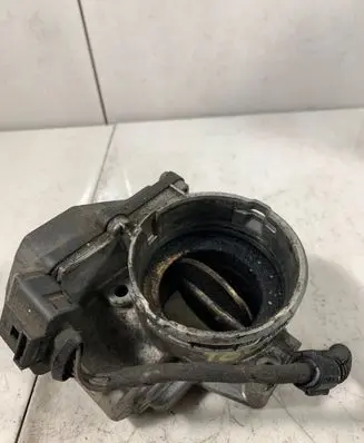 Volkswagen Touran I Throttle valve 03G128063M A2C53324665 608082306