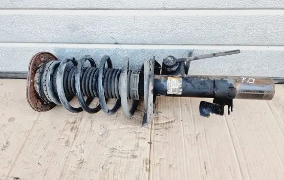 Front shock absorber with coil spring
