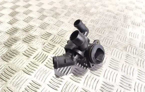 Volkswagen Golf VI Thermostat/thermostat housing 03L121111S