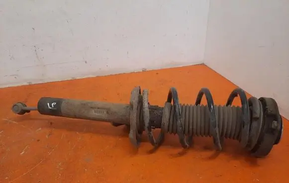 Skoda Octavia Mk2 (1Z) Front shock absorber with coil spring 1K0413031