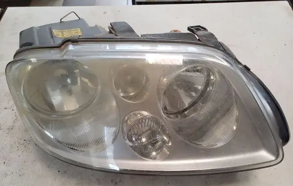Volkswagen Touran I Headlight/headlamp 1T0941006F