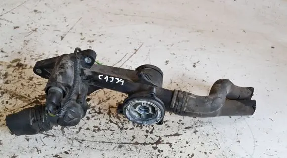 Volkswagen PASSAT B6 Thermostat/thermostat housing 03C121118C