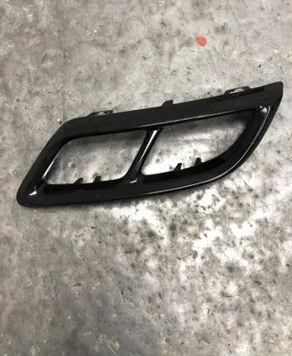 Rear bumper trim bar molding