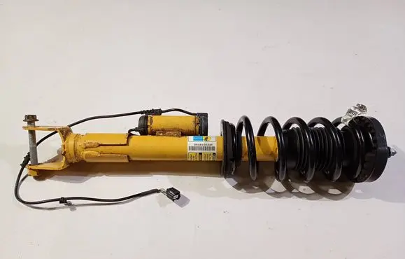 Dodge Charger Front shock absorber with coil spring 05181552AF