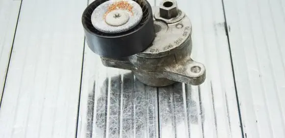 Generator/alternator belt tensioner