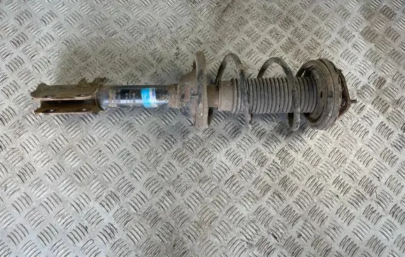 Subaru Impreza I Rear shock absorber with coil spring 